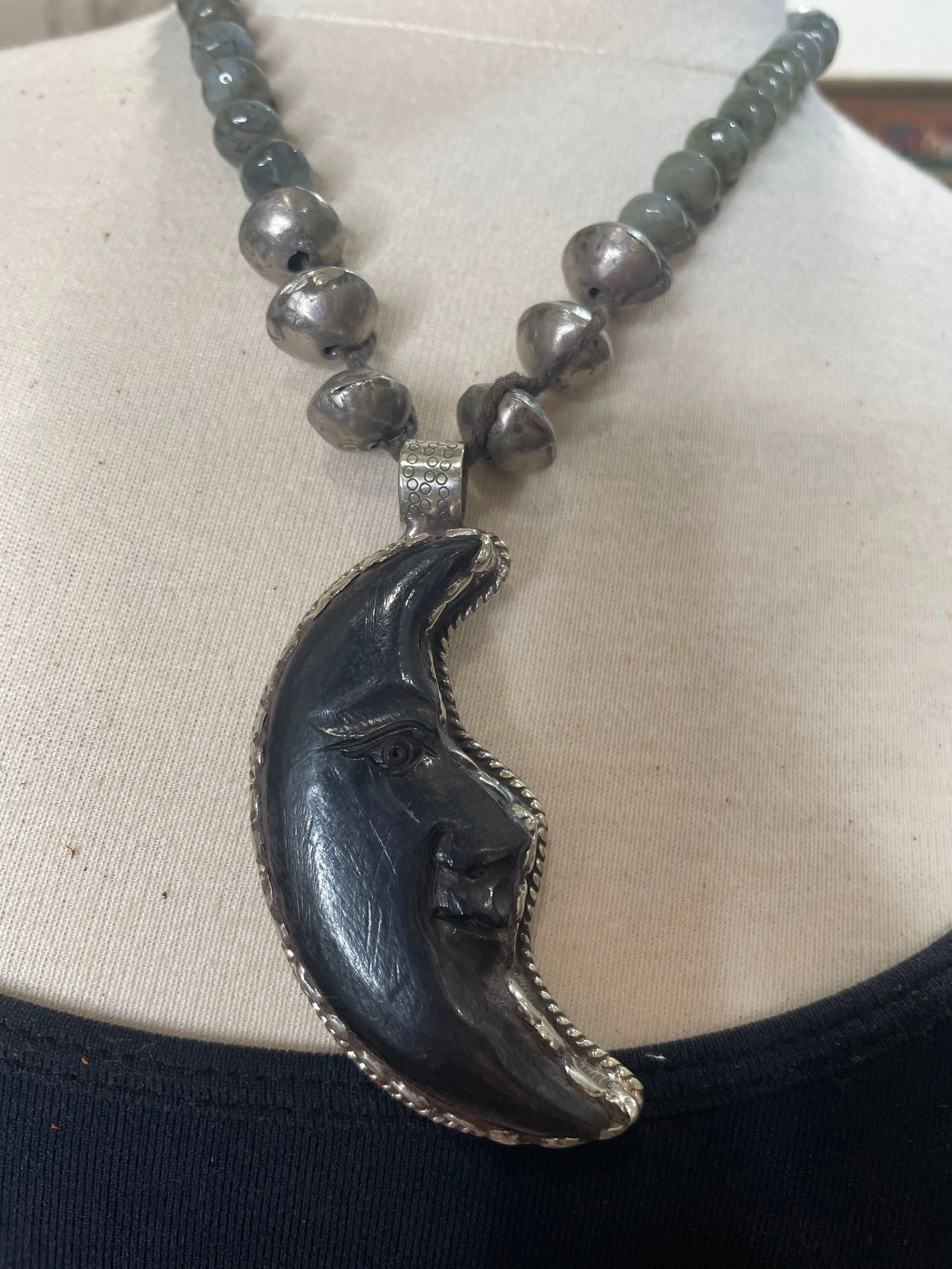 Black Crescent Moon Face Carved Bone Necklace