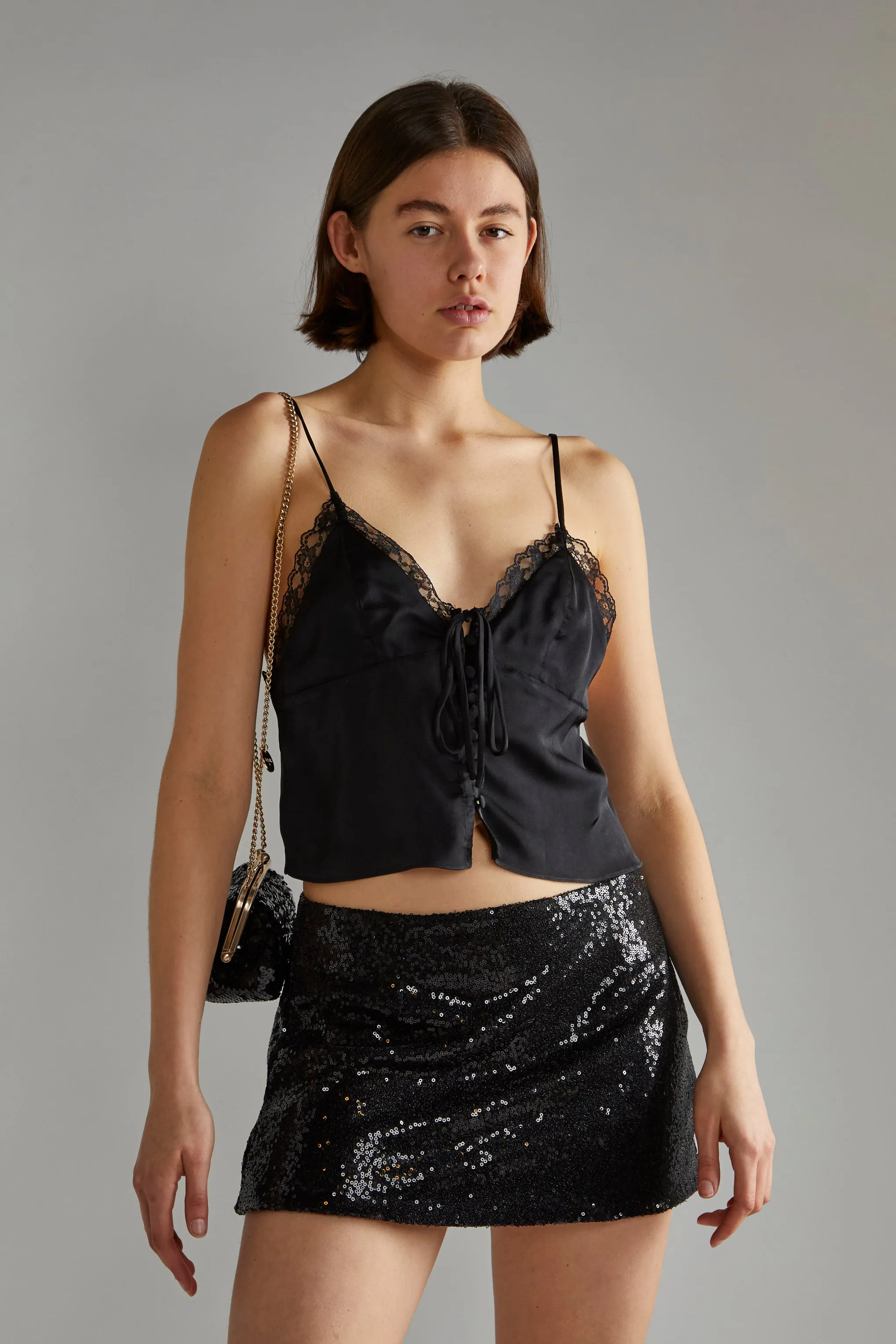 Black-Sequin Peplum Mini-Skirt